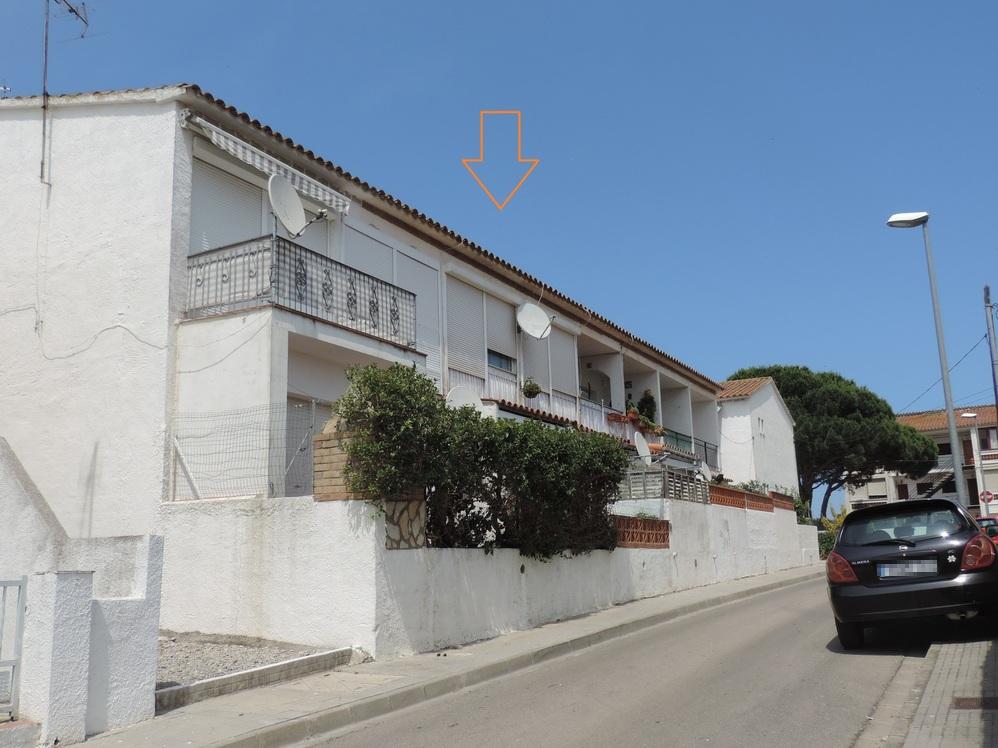 Fachada de la subasta en Escala